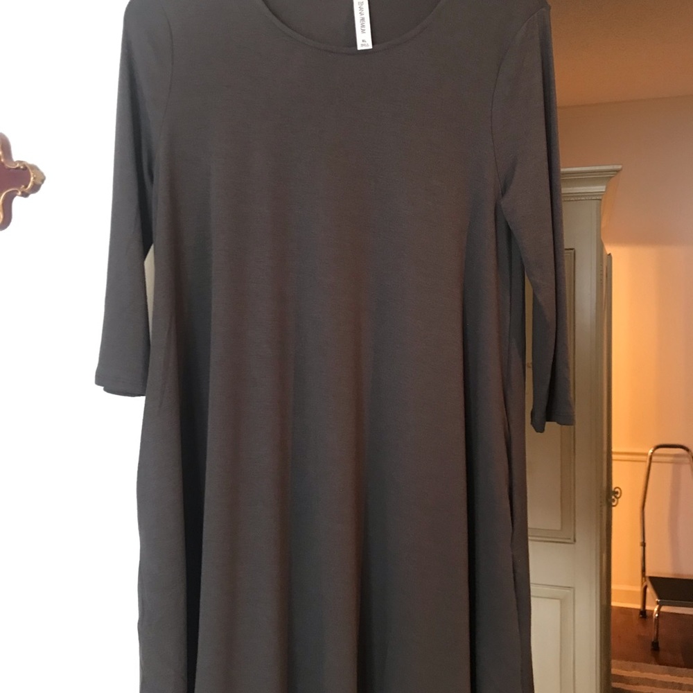 Dark gray knit dress with pockets…never worn…stretchy …boutique